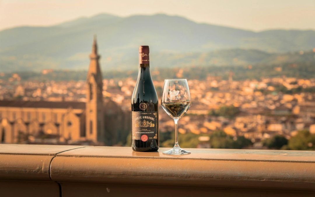 Wine and Glass on Wall in Town in Tuscany