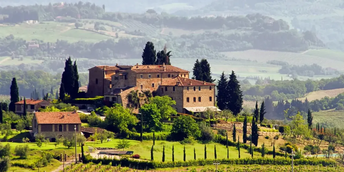 A Tuscan villa among cypress trees in the Chianti hills